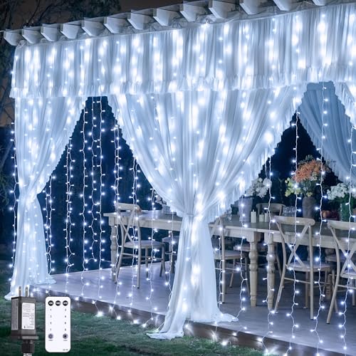 JMEXSUSS 900LED Christmas Curtain Lights Outdoor with Remote, 9.5x29.5ft White Christmas Lights Indoor Plug in, Hanging String Lights for Bedroom Wedding Backdrop Wall Window Xmas Decoration
